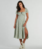 Essential for vacations or summer days, the RSVP To Cute Ditsy Wildflower Tie A-Line Midi Dress is a sundress or milkmaid dress with sleek and flirty details.