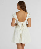 Essential for vacation or concert outfits, the Perfectly Stunning Bow Eyelet Lace Skater Dress is a sundress or milkmaid dress with sleek and flirty details.