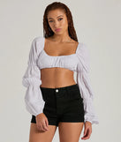 The Official Cutie Tie Back Long Sleeve Crop Top with a modern design and trendy look is part of the latest women's tops collection to elevate your 2025 wardrobe.