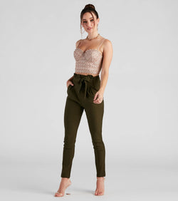 The High Waist Paperbag Skinny Dress Pants in olive is a pair of women's pants with an on-trend leg style and elevated fabric that adds texture, perfect for crafting effortless winter outfits.