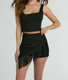 The Shake It Out Rhinestone Fringe Faux Suede Skort offers a discreetly comfy fit with shorts under a stylish skirt overlay featuring the latest accents and details.