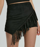 The Shake It Out Rhinestone Fringe Faux Suede Skort offers a discreetly comfy fit with shorts under a stylish skirt overlay featuring the latest accents and details.