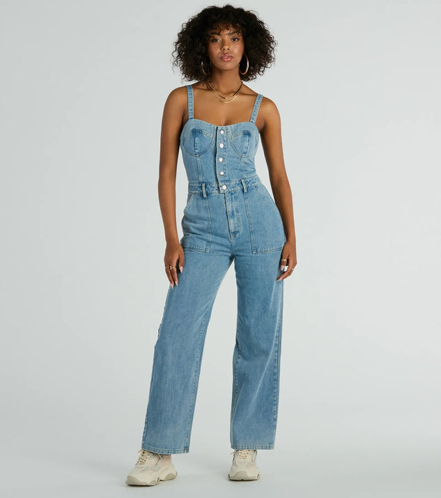 The Trendy Perfection Button Up Wide Leg Denim Jumpsuit is an elevated one-piece that blends sleek sophistication with playful charm, perfect for nailing casual or formal outfits.