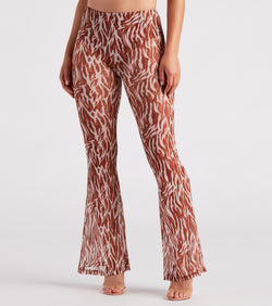 Quick Instinct Zebra Print Mesh Flare Pants is a fire pick to create a concert outfit, 2024 festival looks, outfits for raves, or to complete your best party outfits or clubwear!